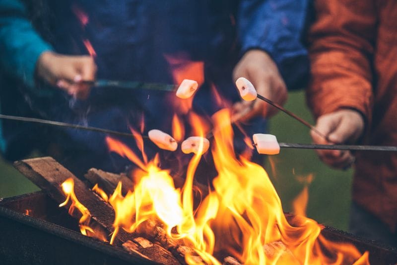 A campfire is also a great heat source during winter camping, perfect for roasting marshmallows!